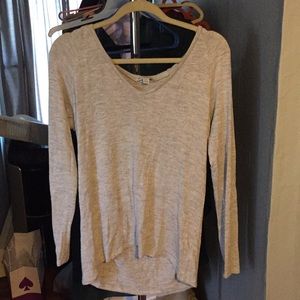 Light gray V-neck sweater